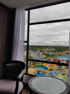 a view of a water park from a hotel room at Bertam Resort & Water Park Penang in Kepala Batas