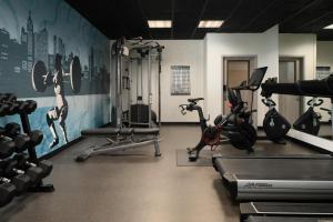 a gym with two treadmills and two exercise bikes at Hyatt Place Secaucus Meadowlands in Secaucus