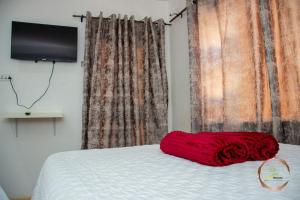 Ένα ή περισσότερα κρεβάτια σε δωμάτιο στο Crestly Resorts Nyanga