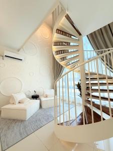 Katil atau katil-katil dalam bilik di Moonhaus - The Apple Melaka +155 gambar