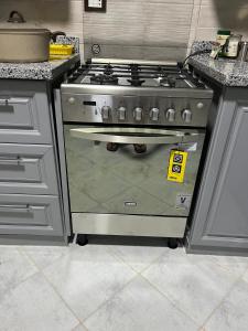 Η κουζίνα ή μικρή κουζίνα στο Garden View apartment