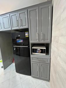 Η κουζίνα ή μικρή κουζίνα στο Garden View apartment +4 φωτογραφίες