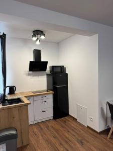 Nhà bếp/bếp nhỏ tại Willa Gazda Apartamenty