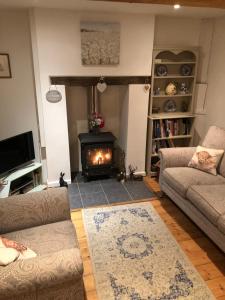 Posezení v ubytování Fern Dale Cottage