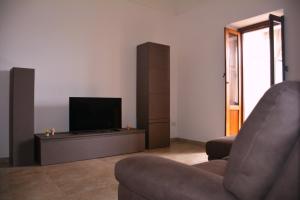 Телевизор и/или развлекательный центр в Bellavista sul Mare