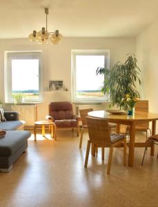 Khu vực ghế ngồi tại "Willkommen im Zetthaus" Welcome! Witamy! Vitejte! - Familienfreundliche Ferienwohnungen in der Mecklenburger Seenplatte