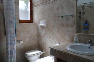 Koupelna v ubytování Bouganville house + 2 fotografie