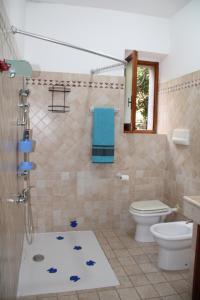 Koupelna v ubytování Bouganville house