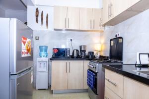 Η κουζίνα ή μικρή κουζίνα στο Jeroshee - Denis Gardens +17 φωτογραφίες