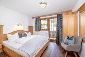 Postel nebo postele na pokoji v ubytování Larchergut