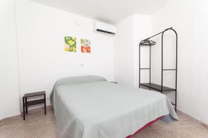 En eller flere senge i et værelse på Family Vacation 2 Bedrooms + 32 billeder