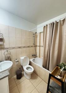 Koupelna v ubytování Stay in Harmony + 6 fotografií