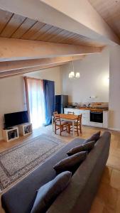 a large living room with a couch and a table at ליד המצוק in Mitzpe Ramon