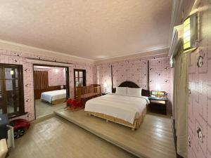 Postel nebo postele na pokoji v ubytování 種子商旅 + 18 fotografií