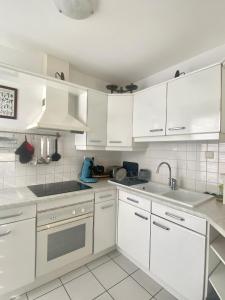 Køkken eller tekøkken på Appartement résidence piscine - Dijon quartier Toison d'Or