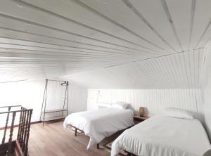 En eller flere senge i et værelse på SOL & SAL T2 Matosinhos