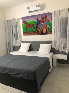 Ένα ή περισσότερα κρεβάτια σε δωμάτιο στο Chez Astou +17 φωτογραφίες