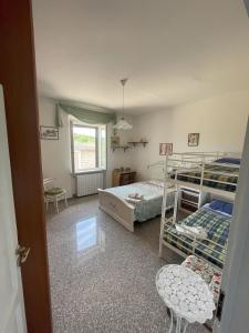 Un pat sau paturi într-o cameră la Podere Sasso Vecchio