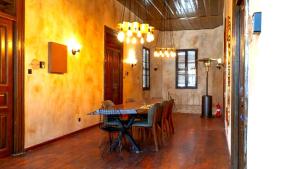 a dining room with a table and chairs at 22 Yedia North Nicosia Turkish Side in Nicosia
