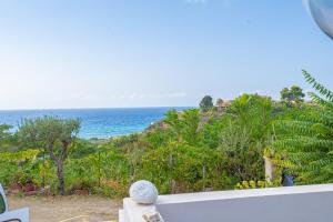 a view of the ocean from a house at Circe in Capo Vaticano