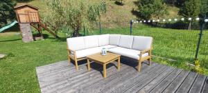 Κήπος έξω από το 2chałupy - apartamenty w Soli