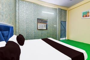 Ένα ή περισσότερα κρεβάτια σε δωμάτιο στο Hotel O Shagun palace +21 φωτογραφίες