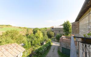a view from the balcony of a house at Stunning Apartment In Ville Di Corsano in Corsano