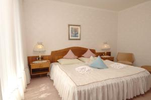 Postel nebo postele na pokoji v ubytování Appartement Eva