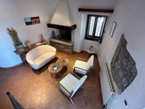 an overhead view of a living room with a fireplace at B&B Mila in Oprtalj