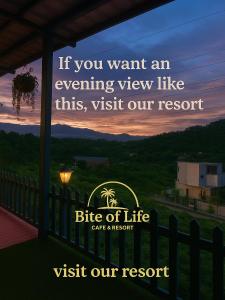 a sign that says if you want an evening view like this visit our resort at Bite of Life Cafe and Resort in Dehradun