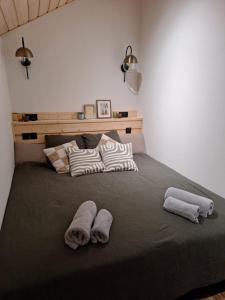 Postel nebo postele na pokoji v ubytování Le chalet Madrier