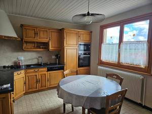 Kuchyň nebo kuchyňský kout v ubytování La chaux