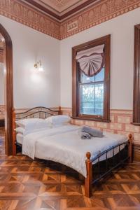Postel nebo postele na pokoji v ubytování Nyerin manor