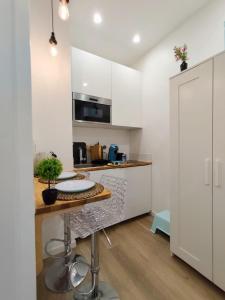 Kuchyň nebo kuchyňský kout v ubytování Suite Bélem - Cosy - Rennes