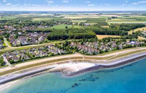 an aerial view of a village on the beach at 3 Bedroom Cozy Home In Wemeldinge in Wemeldinge