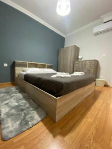Ένα ή περισσότερα κρεβάτια σε δωμάτιο στο Apartment in the center of Thessaloniki