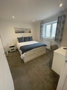 Ένα ή περισσότερα κρεβάτια σε δωμάτιο στο Bed and breakfast near Truro and the A30