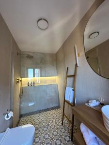 a bathroom with a tub and a sink and a toilet at B&B Mila in Oprtalj +49 photos
