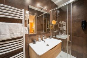 a bathroom with a sink and a mirror at Coronell d'En Vila in Perpignan +86 photos