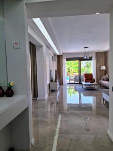 a large living room with a couch and a table at Beys Serenity Villas - C in Kemer +50 photos