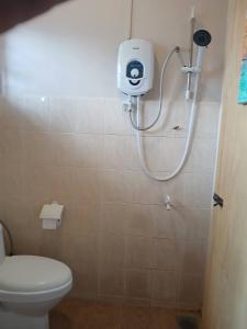 a bathroom with a toilet and a shower in it at Serene Mountain Retreat in KL - Entire House for Rent in Kampong Kelang Gates Baharu +22 photos