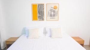 Ένα ή περισσότερα κρεβάτια σε δωμάτιο στο Magico Apartamento Frente al Mar 3 Habitaciones AR53