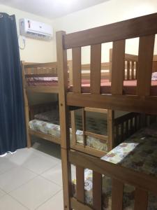 a couple of bunk beds in a room at Apart-Norte Flat Belém Aeroporto in Belém +68 photos