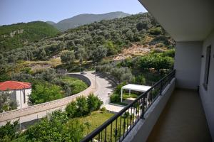 a balcony with a view of a winding road at Olive Tree in Tirana