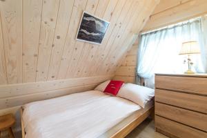 Łóżko lub łóżka w pokoju w obiekcie Gościniec u Bobaków