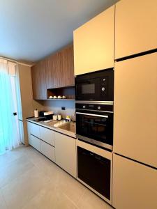 Η κουζίνα ή μικρή κουζίνα στο Zyra Blue Heart