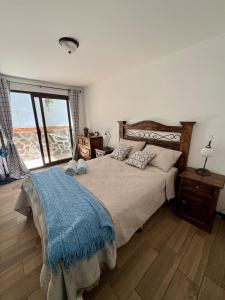 Postel nebo postele na pokoji v ubytování Casa la Higuera Antigua Guatemala