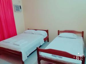 Letto o letti in una camera di Hostal Montecarlos