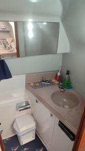 a bathroom with a sink and a mirror at Long term Golf del Sur in San Miguel de Abona