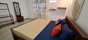 Una cama o camas en una habitación de Amihan Villa Mirissa 10 fotos más